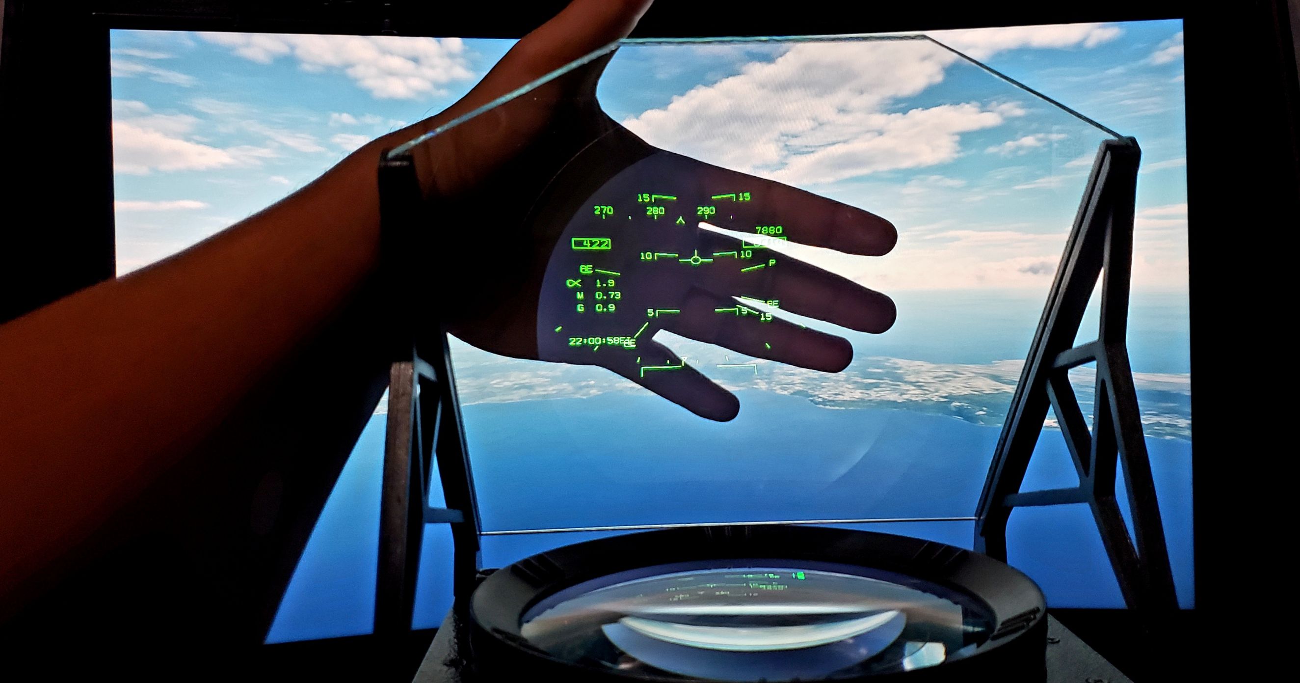 Hand between PC screen and HUD