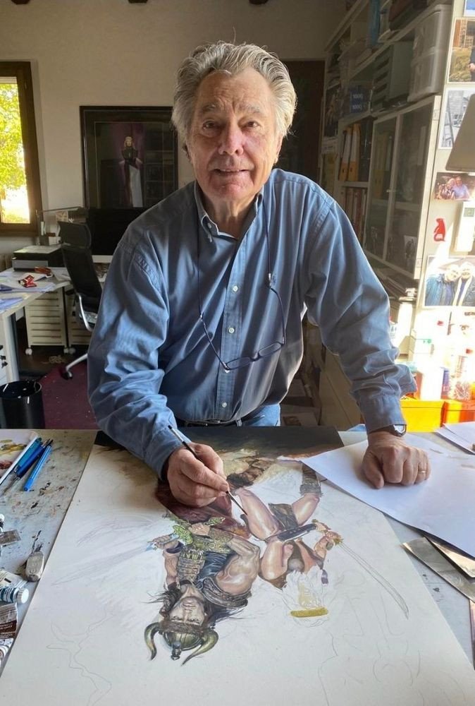 Renato Casaro working on a poster for Conan